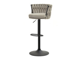 Beige veluurista valmistettu hocker, jossa on mustat jalat ASTER